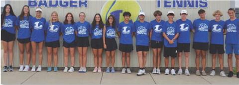 KENNETH PEISER | COURTESY PHOTO The tennis team poses for a photo before heading to Stephenville for their match.