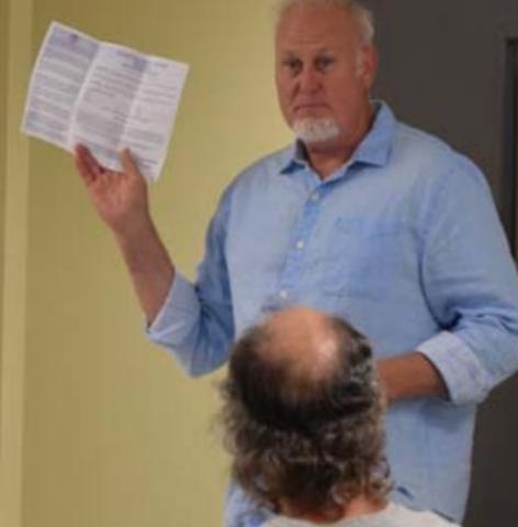 The Rev. Paul Allan speaks to a group of Christians observing the National Day of Prayer. ALEXANDRIA RANDOLPH | DISPATCH RECORD