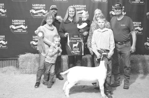 Hadley Kuhl’s mediumweight breeding goat took top honors at Saturday’s Lampasas County Youth Livestock Show. ERICK MITCHELL | DISPATCH RECORD