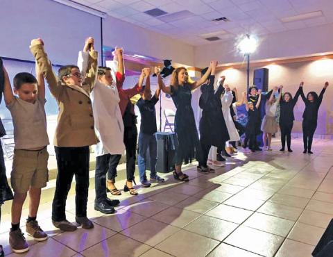Students presented an original play, “Light of the World,” written by teacher Juliana Dwamena, as part of the entertainment at Providence Christian Academy’s annual banquet. julie williams | courtesy photo