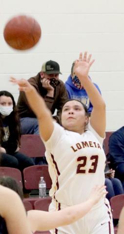 Claudia Carbajal shoots during the Lometa varsity girls’ last district game, on Friday against the Rochelle Lady Hornets. JESSICA MALDONADO | COURTESY PHOTO