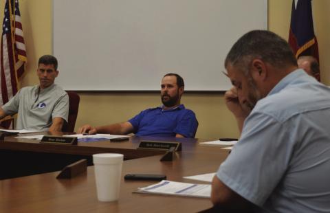 Superintendent Dr. Chane Rascoe, at left, is shown with trustees Ryan Shahan and Jeff Rutland as they consider what facilities improvements make the most sense to include in a bond proposal. ERICK MITCHELL | DISPATCH RECORD