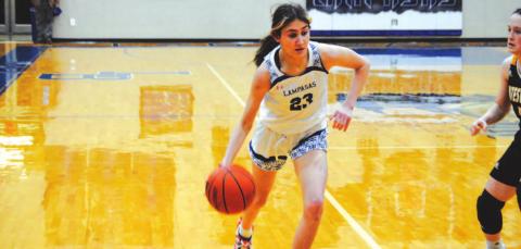 Payton Tatum dribbles past a Gatesville defender on her way to the basket. She scored 22 points in the game Tuesday at home. HUNTER KING | DISPATCH RECORD