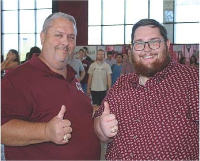 MASON HINES | DISPATCH RECORD John Hines, left, and Mason Hines both received their Aggie rings on April 13.