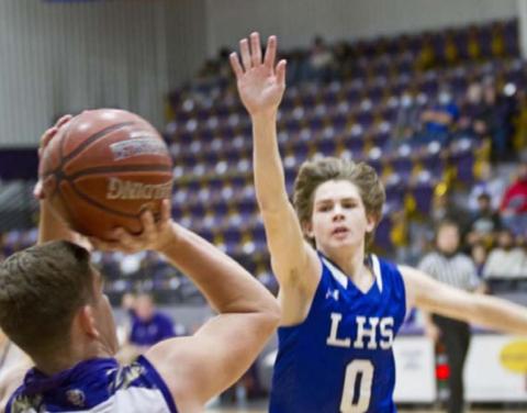 Nate Borchardt, right, plays defense in a non-district victory. FILE PHOTO