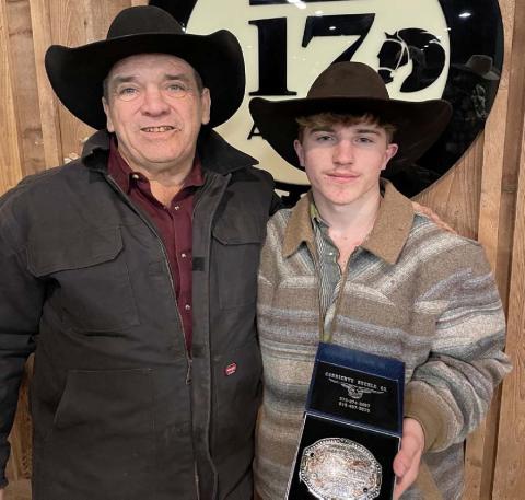 Noah Lee, right, won the 2025 Bullothon and shows off his buckle with Mike Seiler of Bullothon Promotions. COURTESY PHOTO