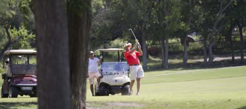 Warren Thornton follows through on a shot on Hole No. 5 during the afternoon tournament benefiting the high school golf program. HUNTER KING | DISPATCH RECORD