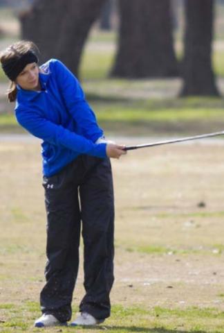 Kenlee Turner hits an approach shot on Hole No. 16. JEFF LOWE | DISPATCH RECORD