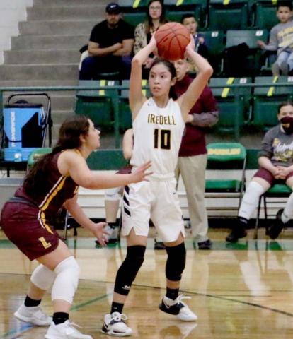 Jasmine Gama guards an Iredell player in the Lady Hornets’ 38-33 seasonending loss in the area playoffs. MEGAN LUSTY | COURTESY PHOTO