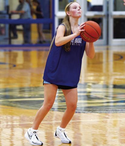 HUNTER KING | DISPATCH RECORD Addison Borchardt shoots a three during summer league.