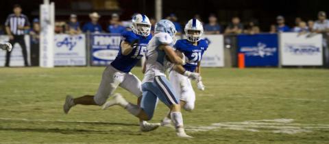 Case Brister and Ethan Moreno pursue the China Spring runner during the matchup with the Cougars last Friday. HUNTER KING | DISPATCH RECORD