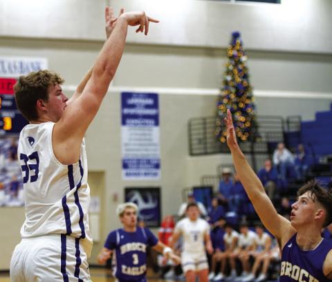 HUNTER KING | DISPATCH RECORD Beau Patterson shoots over a defender during the Badgers’ game against Brock.