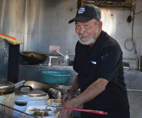 Chef Quan Wong cooked his Chinese cuisine in a food truck over the summer of 2024. erick mitchell | dispatch record