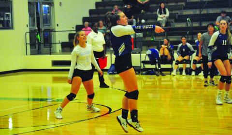 Ava Dowdy makes a pass during the Lady Badgers’ match against Burnet this week. HUNTER KING | DISPATCH RECORD