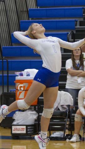 Breanna Quarles goes up to hit a serve during the Lady Badgers’ win over Taylor on Tuesday. HUNTER KING | DISPATCH RECORD
