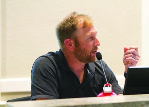 Councilman Edward Gold voices his opposition to a smoke shop planned near the high school campus, but he changed his vote after Interim City Manager Erin Harrison said there were no legal grounds to oppose the special-use permit sought for it. HUNTER KING | DISPATCH RECORD