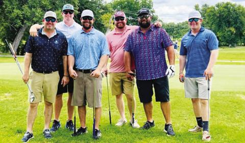 A group from the Jeff Urofsky Memorial Tournament poses for a photo. Winners and results from last week’s scramble event will appear in an upcoming edition of the Dispatch Record. COURTESY PHOTO