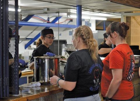 Lampasas High School culinary students were responsible for preparing and delivering dinner at the Creating Badger Builders fundraiser last Saturday. Erick Mitchell | dispatch record