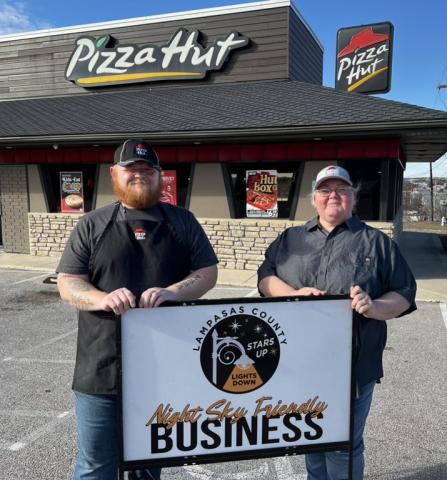Lampasas Pizza Hut associates accepting the Night Sky Friendly award are Joseph White and manager April Ayers. COURTESY PHOTO