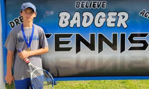 Tyler Ecker is shown with his gold medal from the eighth-grade boys’ singles championship. COURTESY PHOTO