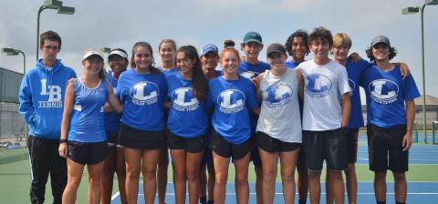 COURTESY PHOTO The Badger tennis squad poses for a photo after their win over Decatur in the bi-district playoff round on Tuesday.