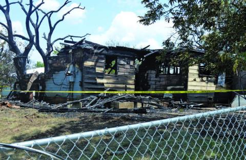 FILE PHTO A single-story home in the 700 block of Brown Streeet became a total loss in June following an early-morning fire.