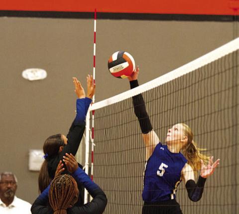 HUNTER KING | DISPATCH RECORD Mattie McBeth rises up for a kill against the Copperas Cove junior varsity team last Friday.