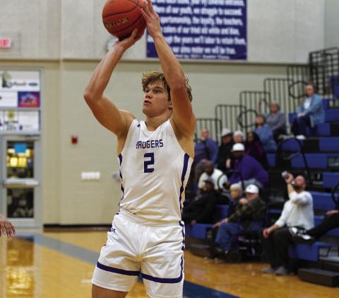 Haegan Oncken releases a three-point shot on his way to 16 points against Taylor. HUNTER KING | DISPATCH RECORD
