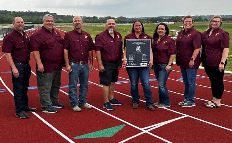 Celebrating the completion of the track facility at Lometa High School are, from left, Superintendent Rob Moore, and trustees John Hines, Matt Molter, Mario Maldonado, Amanda Tower, Megan Lusty, Cristopher Brister and Courtney Duncan. Courtesy photo