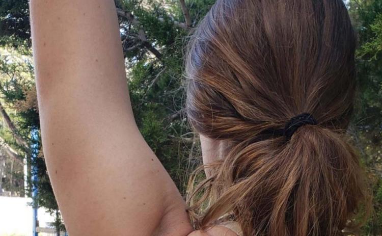 Shoulder stability can be improved by holding weighted objects directly overhead. ALEXANDRIA RANDOLPH MURRELL | DISPATCH RECORD