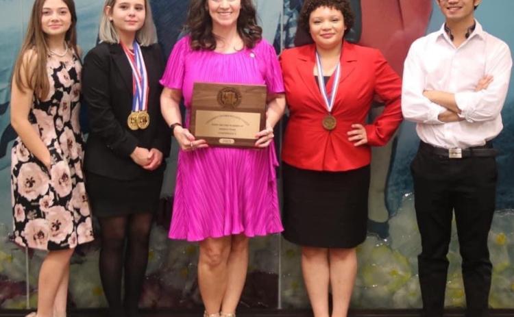 Pictured from left to right are members of this year’s Lometa High School Speech and Debate team: Jewel Groves, Phallon Jones, coach Cheri Jay-Wienecke, Sholee Turner and Bao Nguyen. courtesy photo