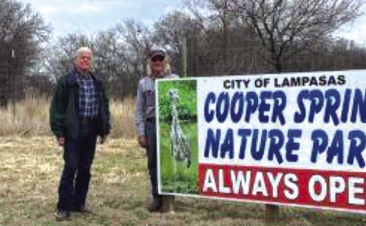 Paul Holland, at left, Hill Country SWCD technician, stands with Cooper Spring Nature Park board member Harrell Clary. The Soil &amp; Water Conservation District recently provided a pollinator wildflower seed mix for the park, and Clary worked to prepare soil beds for the mix. COURTESY PHOTO