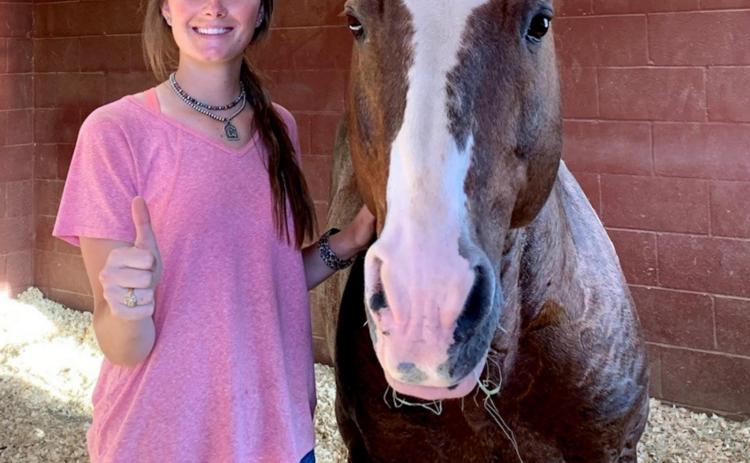 Meagan Cline is shown with a stud horse on the Four Sixes Ranch in West Texas, a ranch known for the quality of its quarterhorses. Cline attends Texas A&amp;M University and comes from a long line of professionals in the equine industry. COURTESY PHOTO