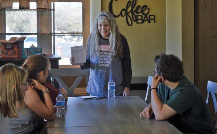Lampasas High School special needs teacher and Wings of Eagles volunteer Becky Veroneau leads a teen dating violence workshop. erick mitchell | dispatch record