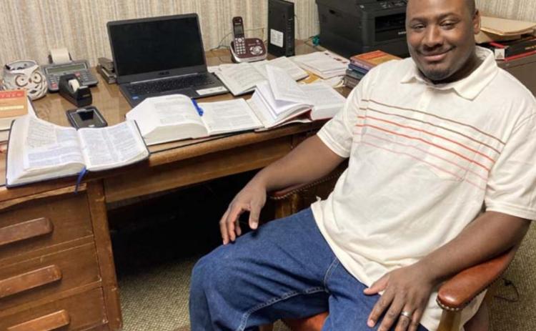 Minister Jaelyn Downey is shown in his office at the Lometa Church of Christ. He graduated from the Brown Trail School of Preaching and joined the Lometa congregation in December. MADELEINE MILLER | DISPATCH RECORD
