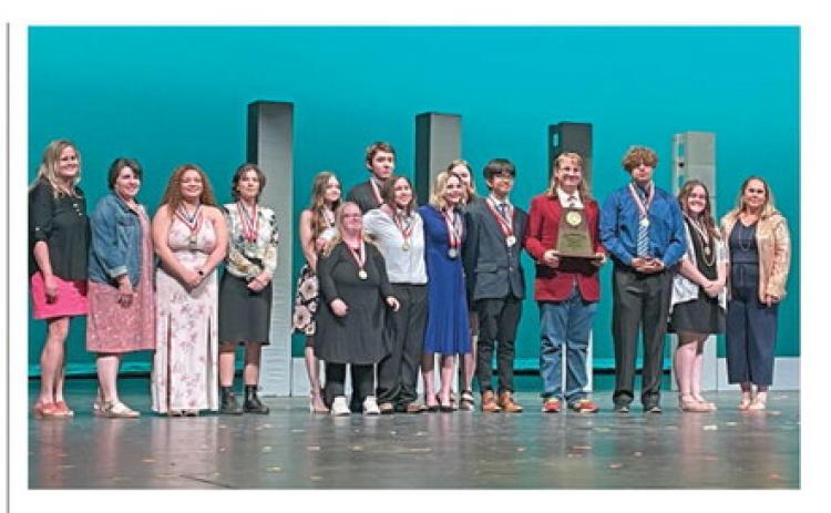 COURTESY PHOTO Lometa’s production of “Distance” will advance to regional One-Act Play competition. On the stage are, from left, Tiffany Smart, Julie Bradley, Sholee Turner, Rosa Garrido, Jewel Groves, Jolie Ann Thomas, Diego Garrido, Phallon Jones, Eva Bradley, Bao Nguyen, Douglas Thomas, Jacob Wooten, Cora Groves and director Heather Moresco.