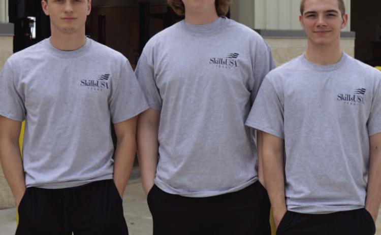 LHS automotive students, left to right, Sean Smith, Ryan Dane and Shawn Roberts are advancing to the Skills USA Texas state competition in April with their Scorpion go-kart build. ERICK MITCHELL | DISPATCH RECORD