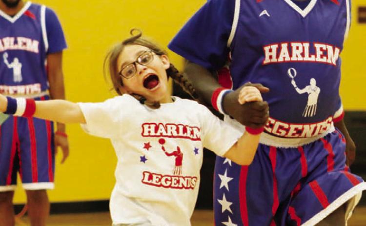 Lometa fifth-grader Kyla Kepler (white shirt) was excited to be a part of the show with Legend Michael Douglas. MASON HINES | DISPATCH RECORD