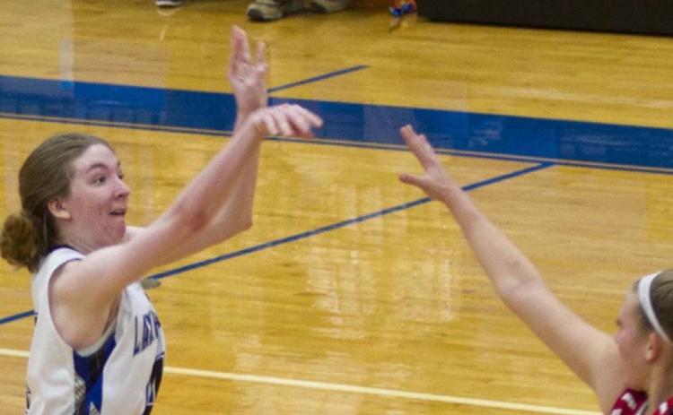 Taylor Allen knocks down a three-pointer from about 24 feet out to bring Lampaas within two points of Glen Rose. Later, she tipped in the game-tying basket at the end of regulation. JEFF LOWE | DISPATCH RECORD