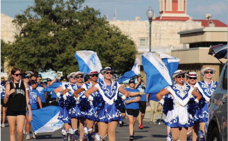 JOYCESARAH MCCABE | DISPATCH RECORD The Lampasas High School Flames march with pride in the 2023 Homecoming Parade.