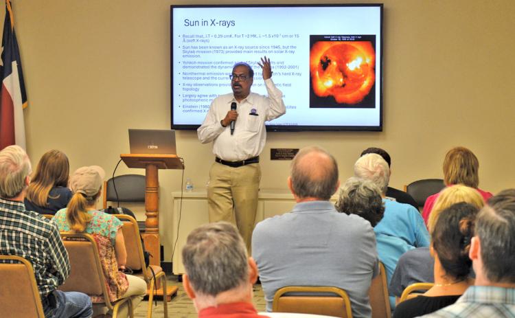Dr. Nat Gopalswamy addresses an audience at the Lampasas Public Library. The NASA scientist also was at the 580 Sports Complex Monday to study features of the sun during the eclipse. erick mitchell | Lampasas Dispatch Record