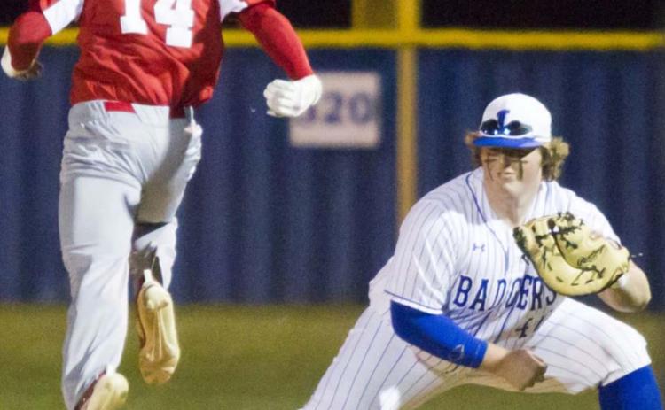 Senior first baseman Hayden Waldrip steps on first to force an out in a district game against Glen Rose during a three-game winning streak that ended on Monday. JEFF LOWE | DISPATCH RECORD