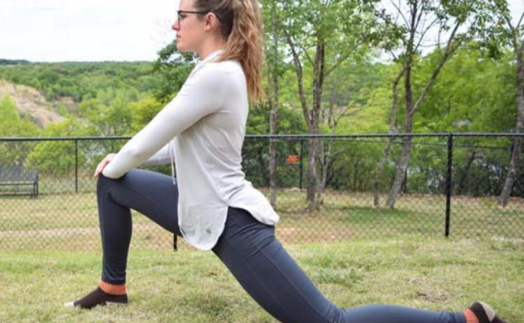 From a lunge position, as shown above, focus on pressing the pelvis toward the ground. This “upright lizard pose” can help stretch the hip flexors. COURTESY PHOTO