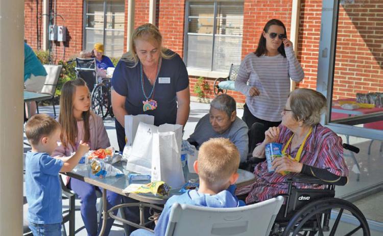 Lampasas Nursing and Rehabilitation Center residents and visitors were treated to a hot dog lunch for Thursday’s Easter celebration. erick mitchell | dispatch record