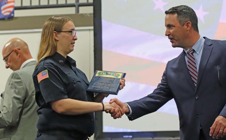 Bailey Harner is awarded Firefighter of the Year honors for Kempner Volunteer Fire Department. She accepts her award from 424th District Court Judge Evan Stubbs. COURTESY PHOTO | HILL COUNTRY 100 CLUB