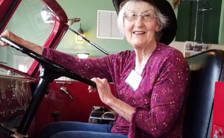 Nancy Kahlstrom of Lampasas, a Central Texas Travel Club member, is shown on a 1950 American LaFrance 750-gpm pumper known as “Invader” at Brenham Fire Department #1 while on a recent tour of Brenham and Chappell Hill. COURTESY PHOTO