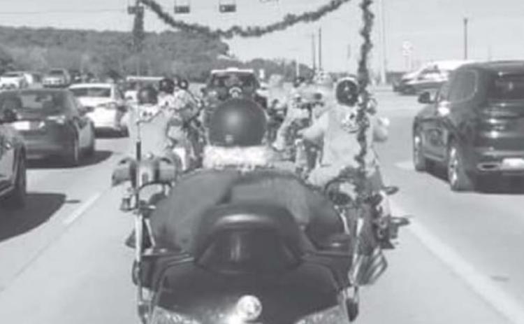 The Silverbacks Motorcycle Club is pictured during its 2019 Santa &amp; Reindeer Ride. MADELEINE MILLER | DISPATCH RECORD