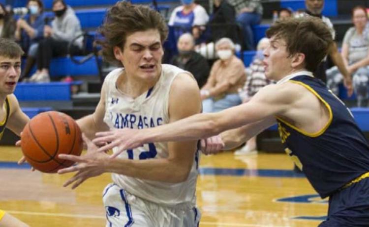 Landon Mulcahy drives to the basket in an earlier district game before the Badgers’ loss at Glen Rose. JEFF LOWE | DISPATCH RECORD