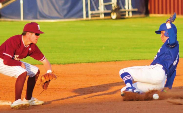 Tak Stinnett slides safely into second for a steal. Stinnett had three RBIs, and the Badgers cut a nine-run deficit down to three runs but lost Tuesday. JEFF LOWE | DISPATCH RECORD