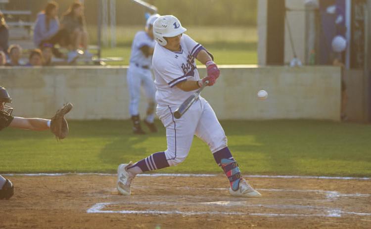 Benny Rodriguez swings at a pitch during Tuesday’s game. He ripped a single into left field. HUNTER KING | DISPATCH RECORD